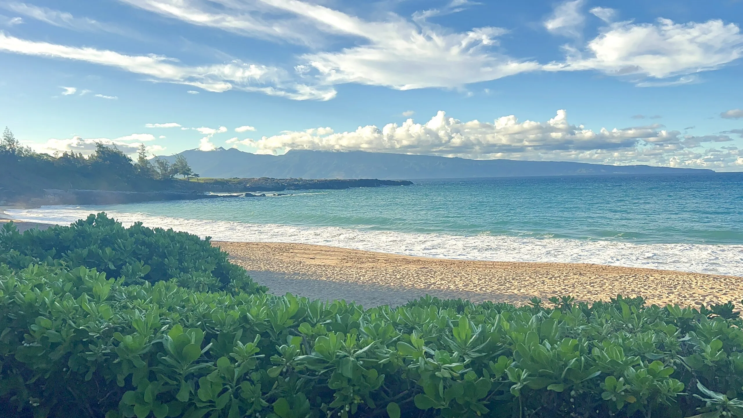 Pristine beach on Maui overlooking Hawaiian Island