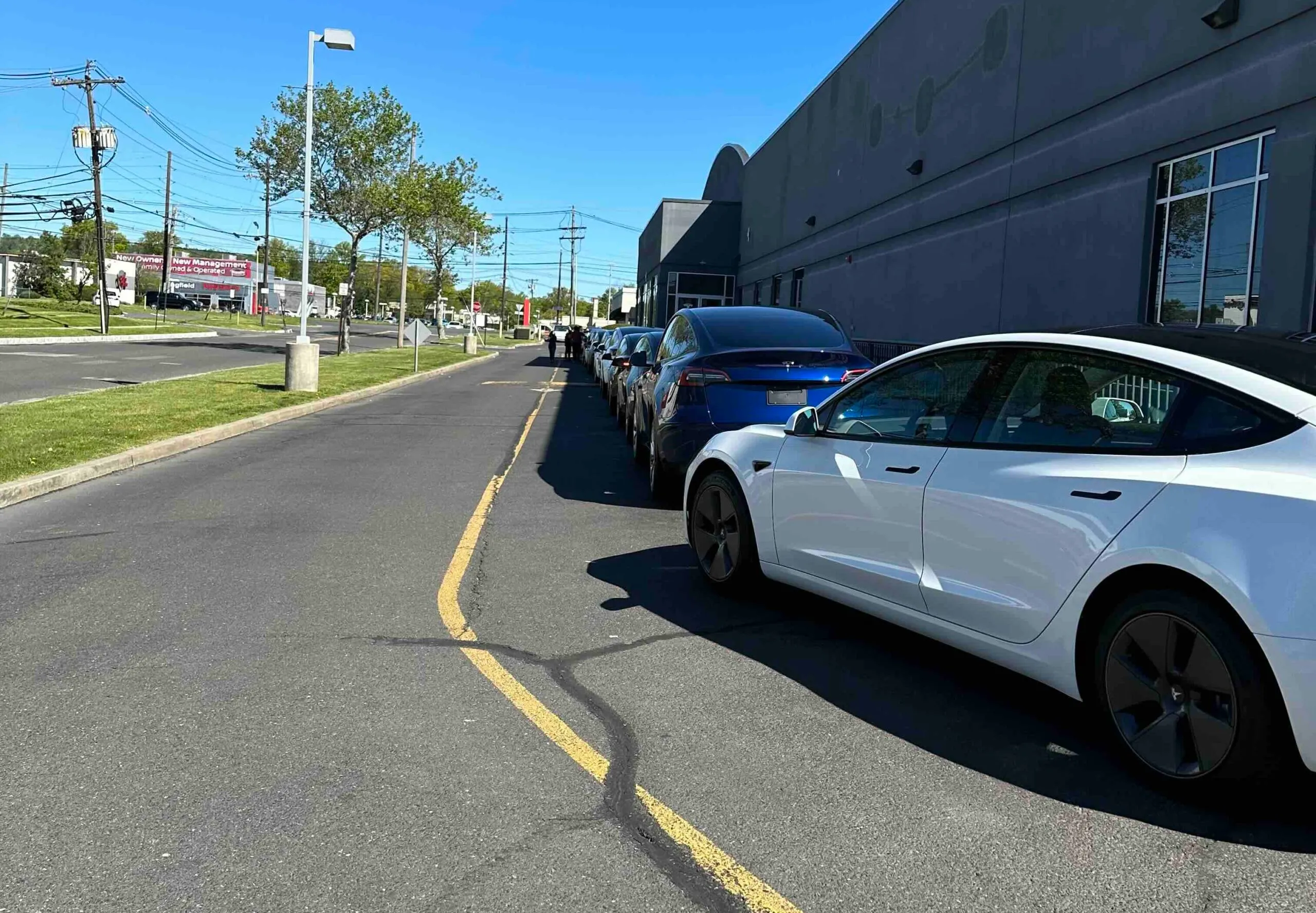 Lineup of Commuter Ready Tesla Model 3's - Most Practical Commuter Vehicle