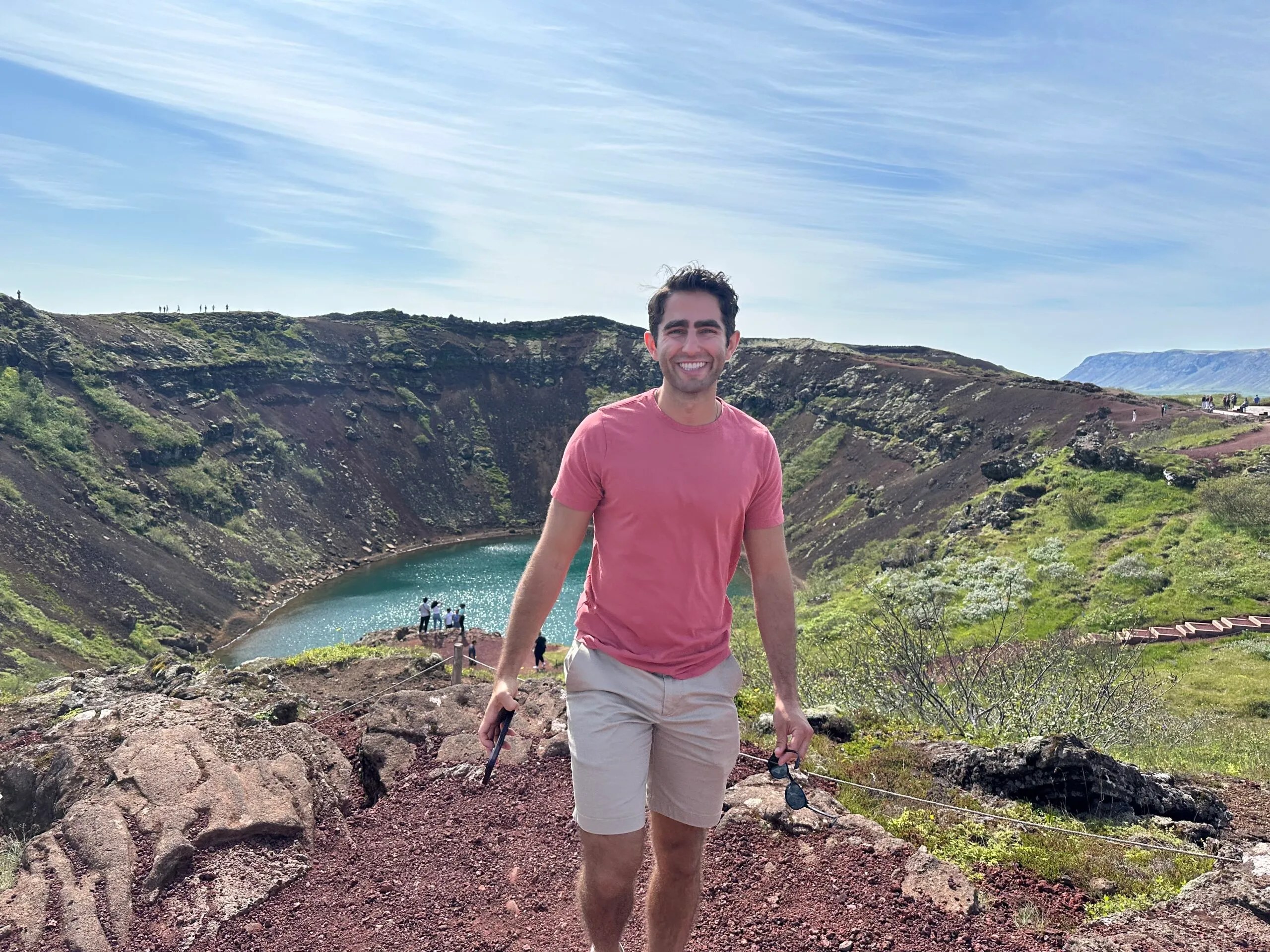 Author of Imperfect Nostalgia in front of Kerid Crater in Iceland - Iceland Travel Tips 2024