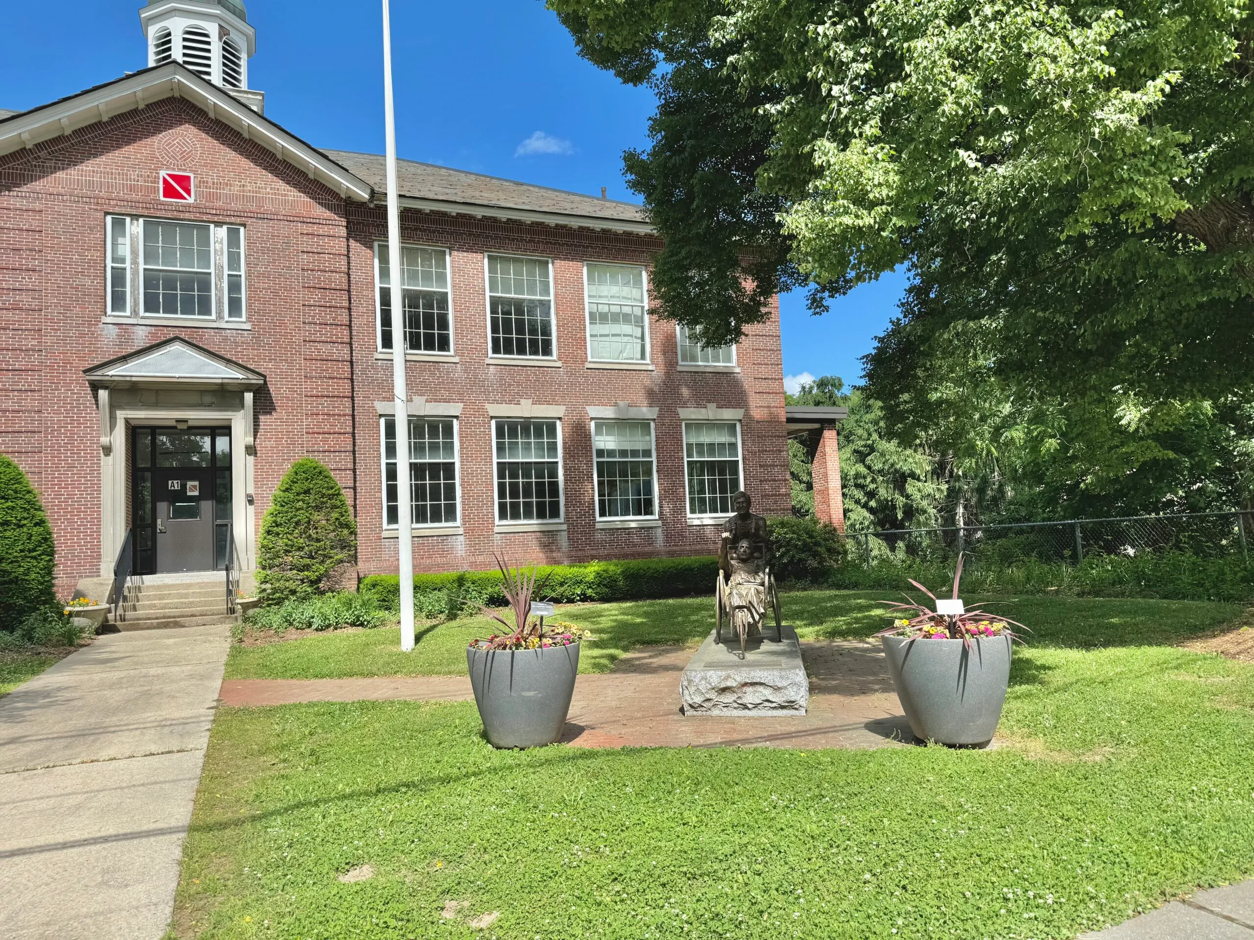 Statue at the starting line of the Boston Marathon in Hopkinton, MA