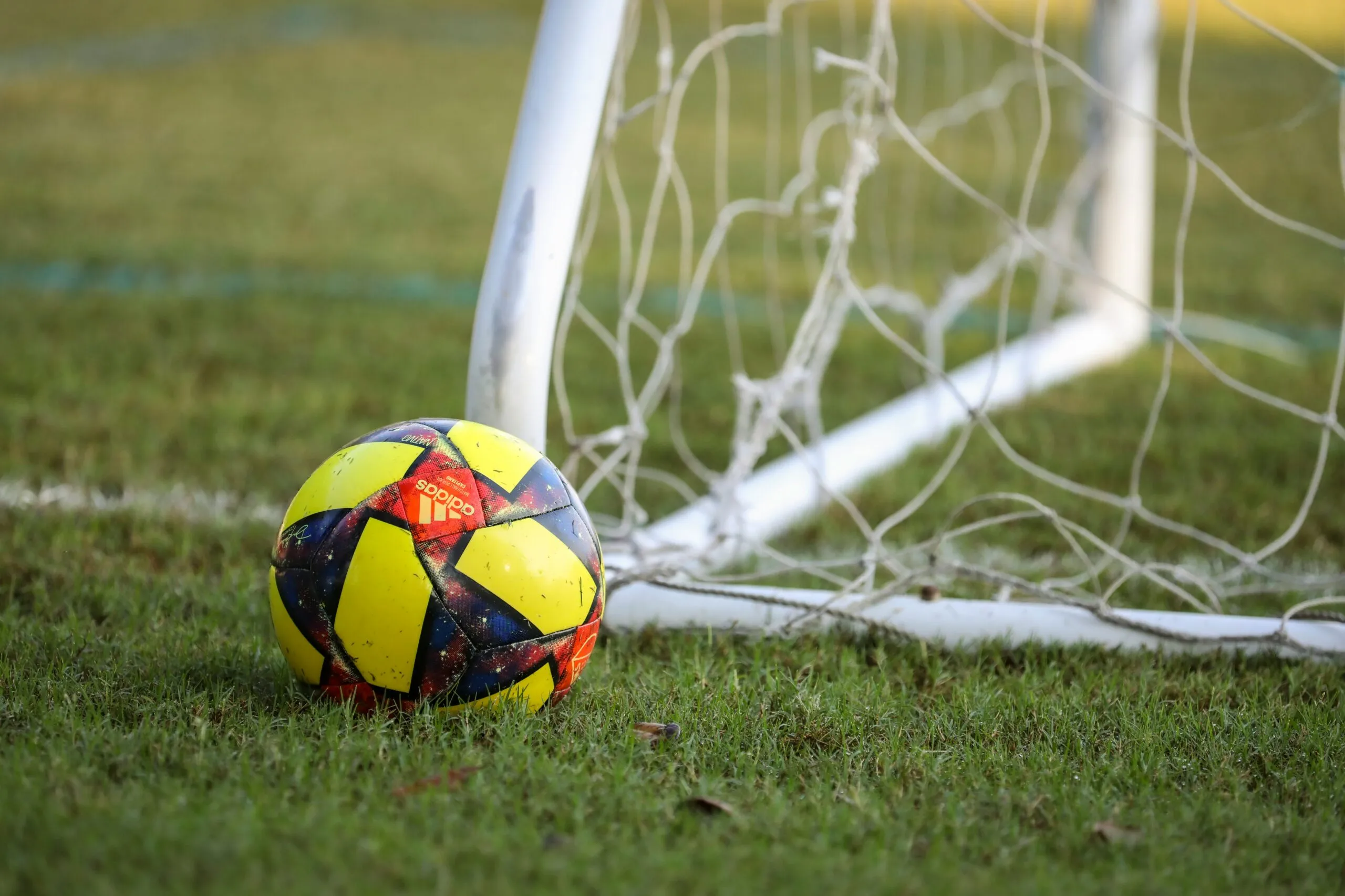 Soccer ball on turf athletic field